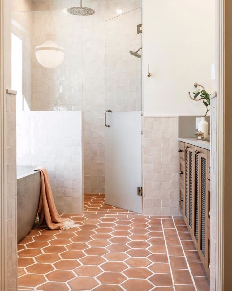 Side-by-side of handmade Saltillo tile and honed travertine showing colour variation and texture