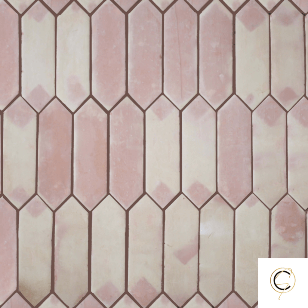 Rustic handmade terracotta floor tile in warm golden-red tones with natural surface variation