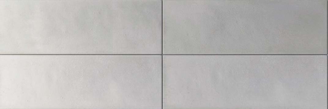 Matt-finish greige porcelain tile, 50 × 150 mm, with gentle tonal variation