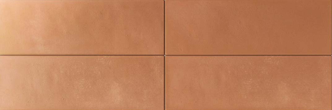 Rich terracotta porcelain tile in matt finish, 50 × 150 mm, ideal for feature walls