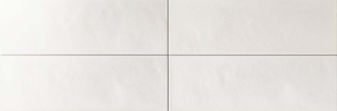 Matt white porcelain wall tile, 50 × 150 mm, with a smooth soft-touch finish