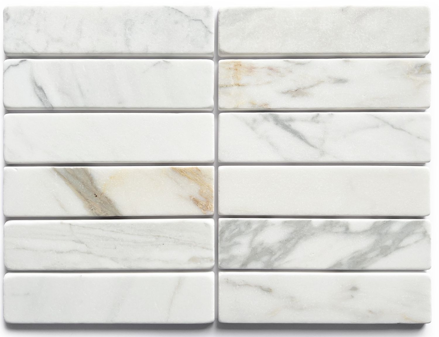 Slim tumbled natural stone batons laid in a soft neutral herringbone pattern, showing subtle surface variation and texture, suitable for indoor or outdoor use.