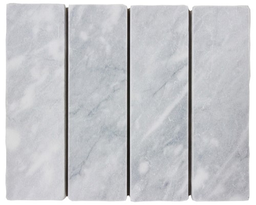 Slim tumbled natural stone batons laid in a soft neutral herringbone pattern, showing subtle surface variation and texture, suitable for indoor or outdoor use.