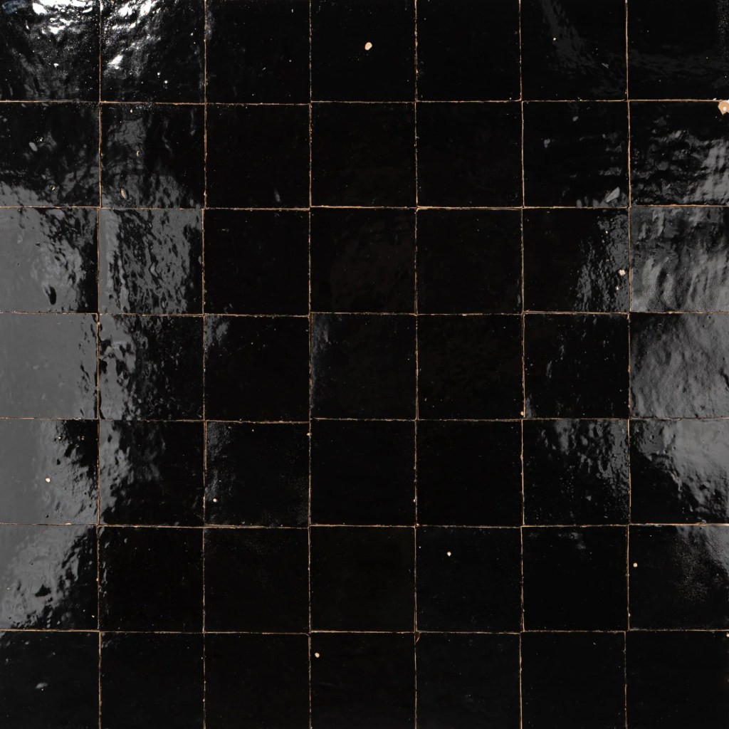 Black Handmade Moroccan Zellige Tile in 100x100 format featuring deep black glaze and handcrafted Moroccan variation.