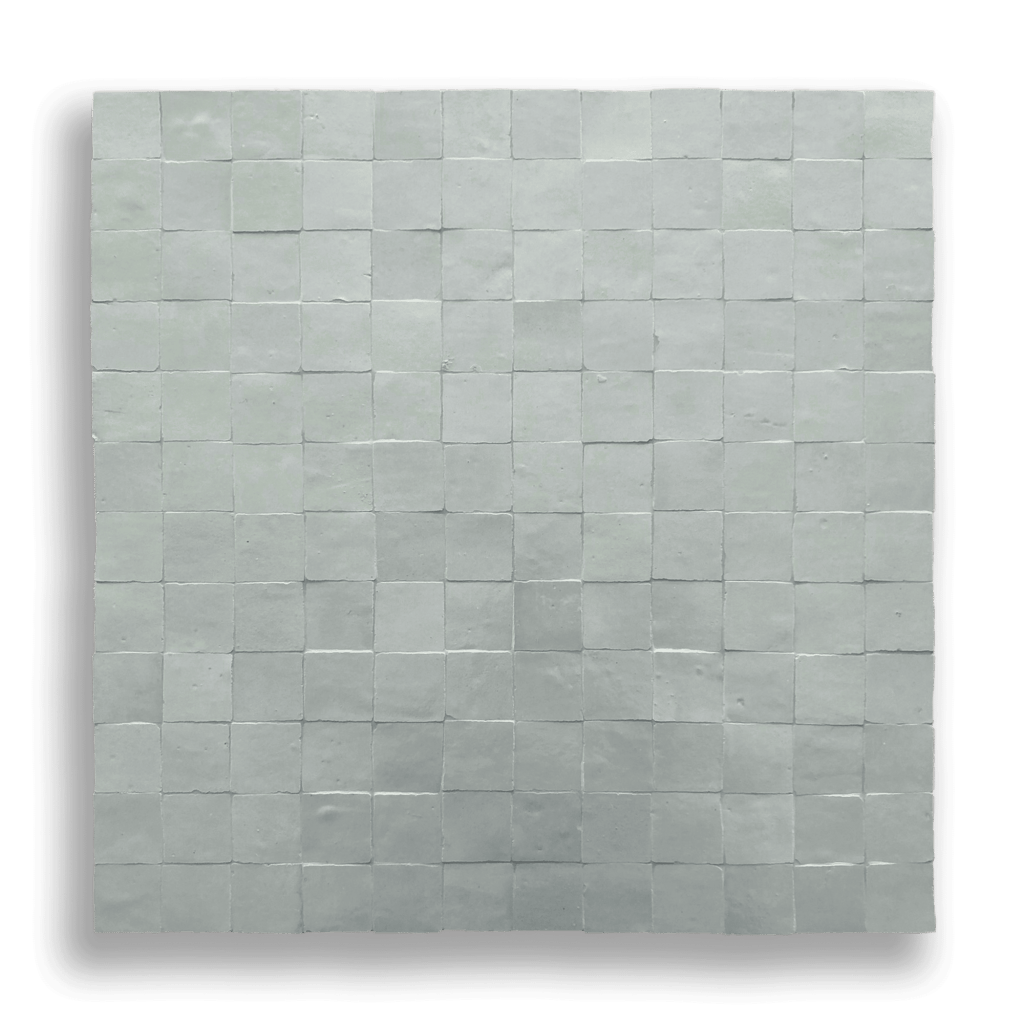 Mini Aqua Moroccan Zellige Mosaic Tile featuring soft aqua blue tones and handcrafted Moroccan variation.
