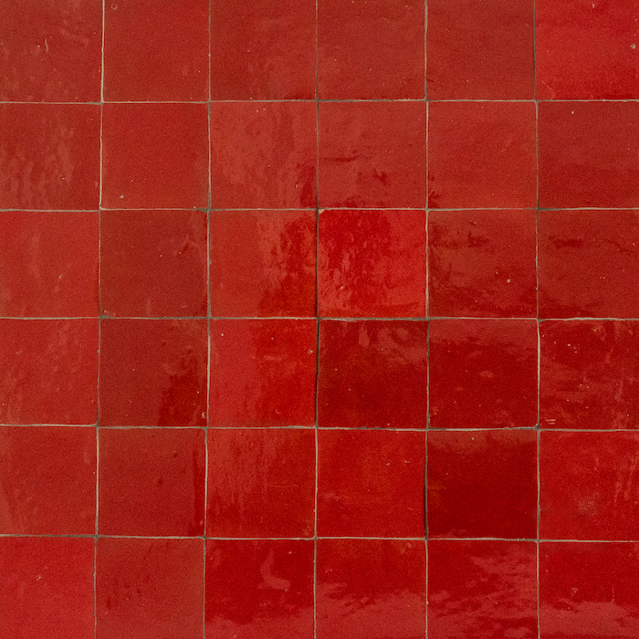 Red Handmade Moroccan Zellige Tile in 100x100 format featuring vibrant red glazing and authentic handcrafted character.
